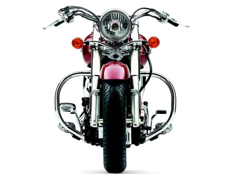 Vintage cruiser motorcycle with chrome accents and red paint for Australian motorcycle enthusiasts.
