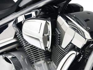 V8 motorcycle engine with chrome and black detailing, showcasing high-performance motorcycle features.
