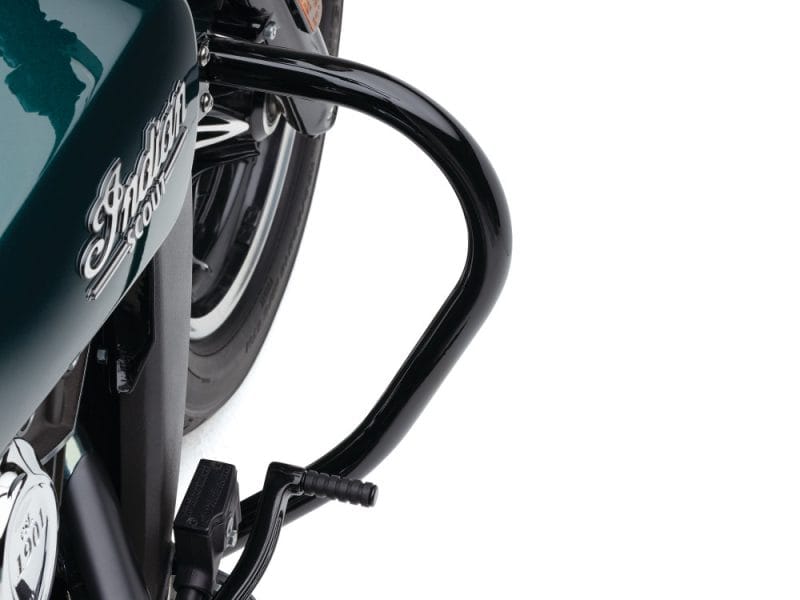 Custom motorcycle crash bar on a black and teal Revelry motorcycle, designed for protection and style.