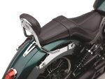 Yamaha cruiser motorcycle seat and rear fender with chrome details and black suspension.