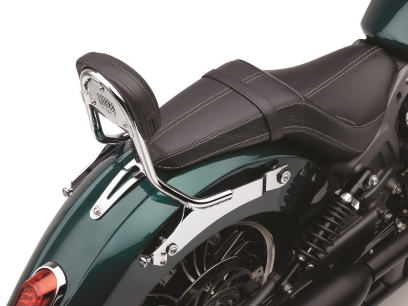 Yamaha cruiser motorcycle seat and rear fender with chrome details and black suspension.
