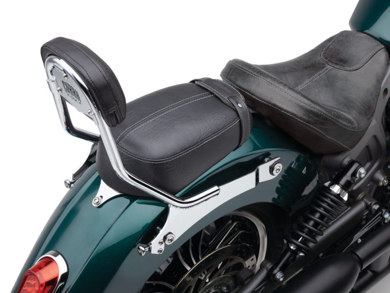 Vintage motorcycle seat and tail light on classic Harley bike.