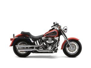 Sharp Harley-Davidson motorcycle with black and red design, chrome detailing, and classic cruiser style.
