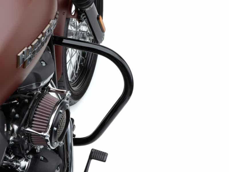 Engine Guard Freeway Bar - Black. Fits Softail Street Bob & Low Rider 2018up & Standard 2020up. Riveted black crash bar on a vintage-style Revelry Motorcycles Harley Davidson bike.