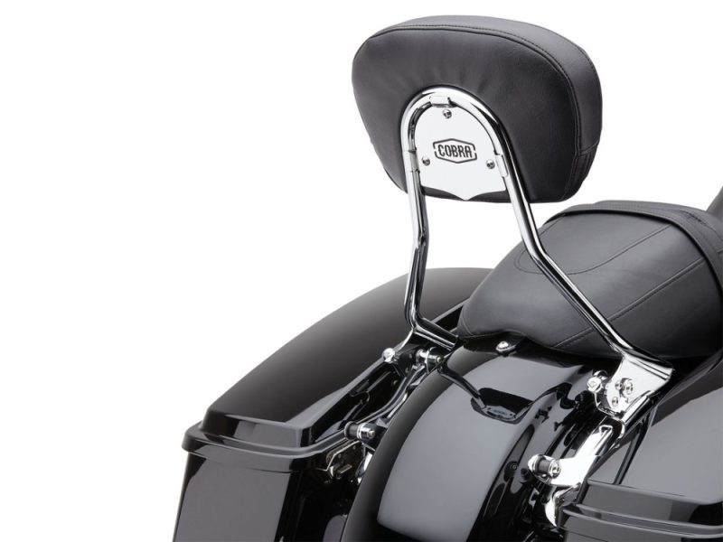 Short Quick Detachable Sissy Bar Kit - Chrome. Fits Touring 2014up. Motorcycle passenger backrest with Cobra logo, chrome finish, and black leather seat for Harley-Davidson bikes.