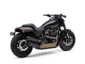 Sleek black Harley-Davidson cruiser motorcycle with custom exhaust and rugged tires, ideal for motorcycle enthusiasts.