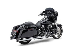 Black Harley-Davidson touring motorcycle with saddlebags and chrome exhaust pipes.