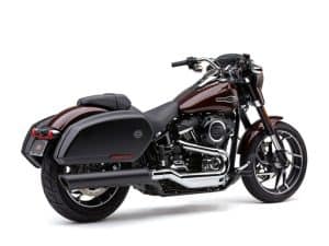 Vivid black Harley-Davidson touring motorcycle with saddlebags and chrome accents.