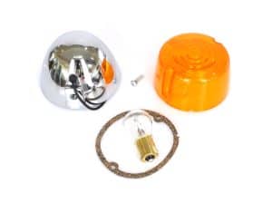 Chrome motorcycle taillight assembly with orange lens and bulb for Revelry Motorcycles.