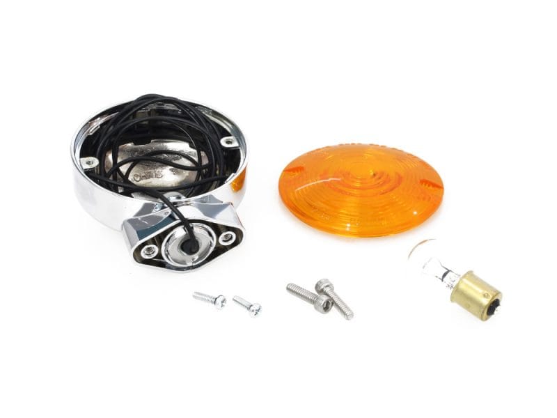 Chrome motorcycle turn signal assembly with amber lens for Revelry Motorcycles.