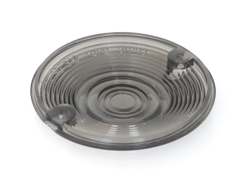 Transparent round motorcycle LED indicator cover with concentric ring design.