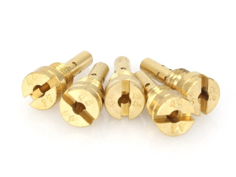 Gold motorcycle axle adjuster screws for Revelry motorcycles.