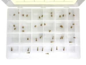 Small brass motorcycle screw assortment in plastic storage box.