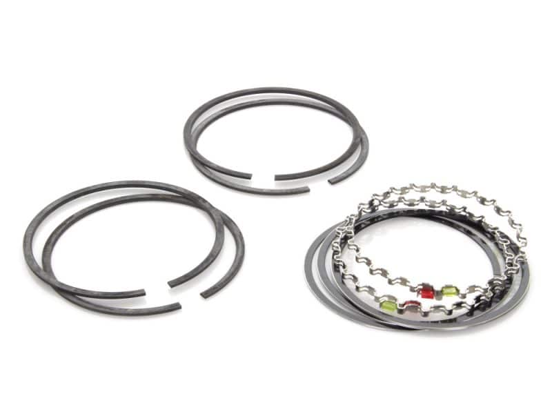 Oil seal ring and chain kit for motorcycle engine maintenance.