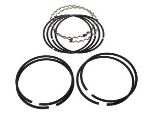 Black motorcycle piston ring set with chains and cables for Revelry Motorcycles repair parts.