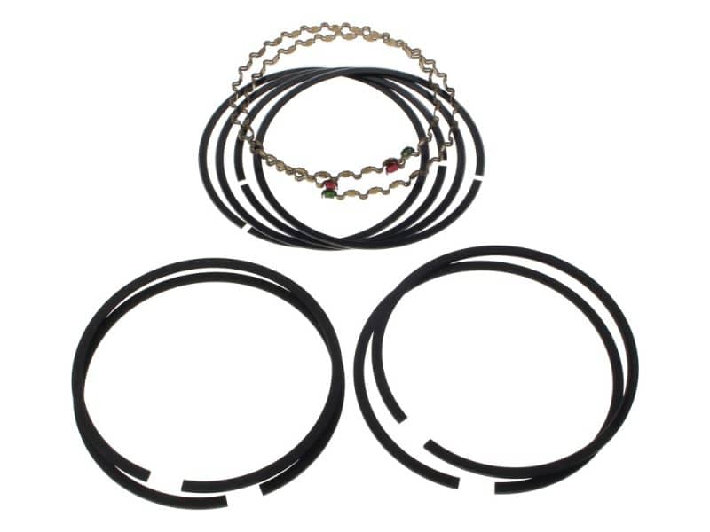 Black motorcycle piston ring set with chains and cables for Revelry Motorcycles repair parts.