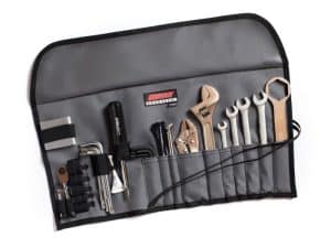 Professional motorcycle tool roll with essential bike maintenance tools for Revelry Motorcycles.