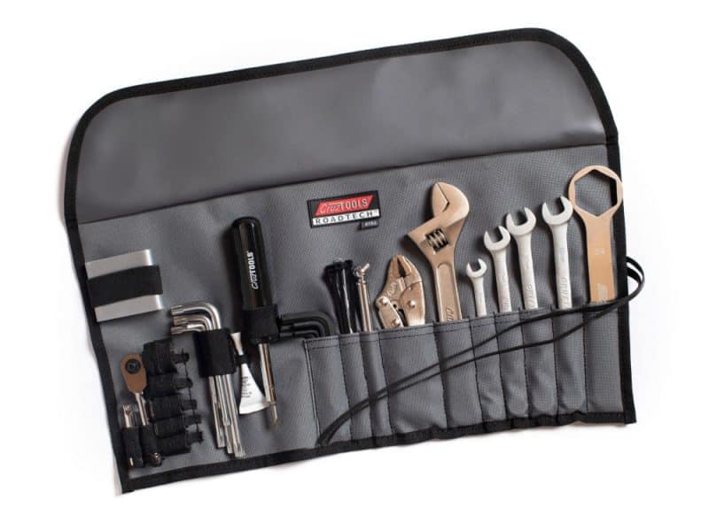 Professional motorcycle tool roll with essential bike maintenance tools for Revelry Motorcycles.