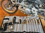High-quality motorcycle repair tool kit with wrenches and screwdrivers for Revelry Motorcycles.