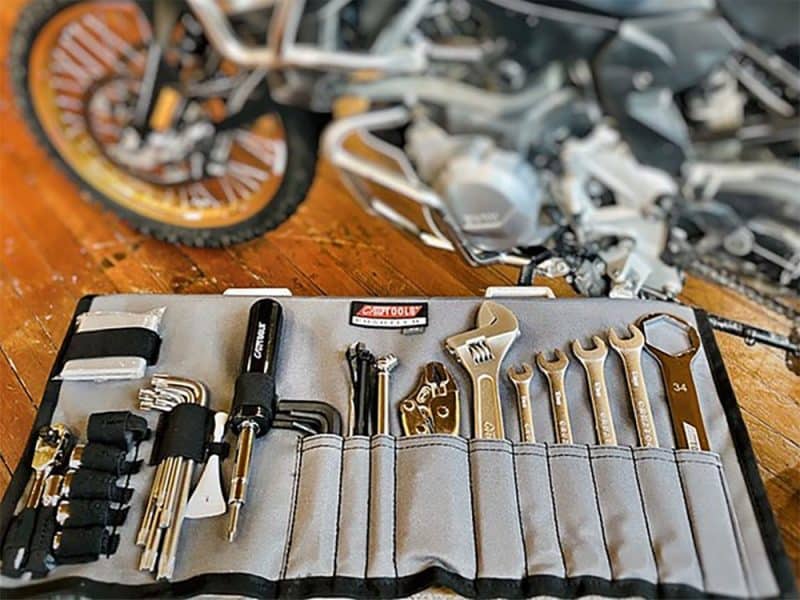 High-quality motorcycle repair tool kit with wrenches and screwdrivers for Revelry Motorcycles.