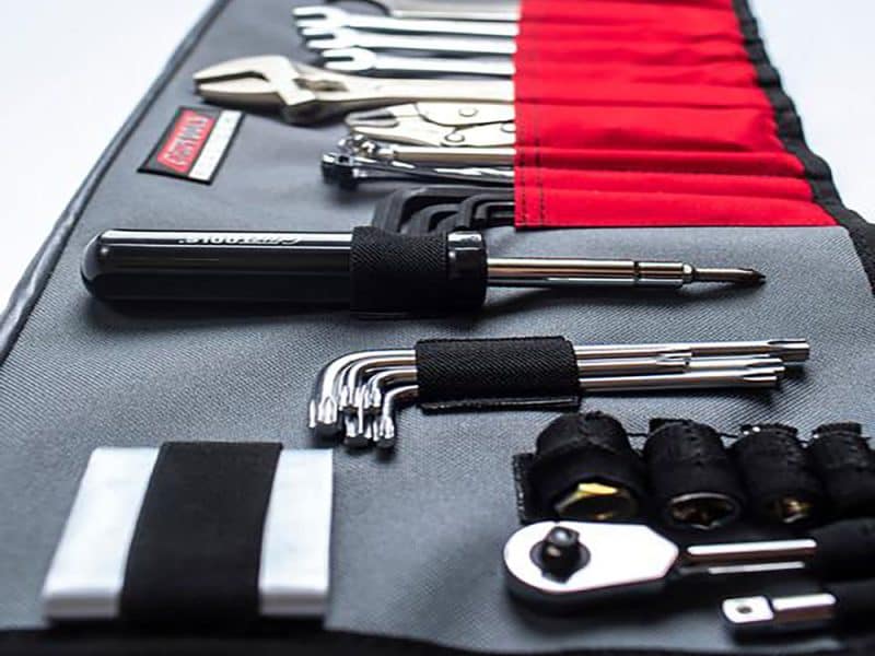 High-quality motorcycle tool kit with wrenches, screwdrivers, and tyre levers for Revelry Motorcycles enthusiasts.