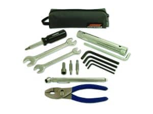 Snap-on motorcycle tool kit with screwdrivers, wrenches, Allen keys, and pliers for bike maintenance.