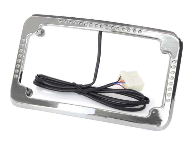 Curved Slick Signal Run Chrome motorcycle headlight bezel with wiring harness for Revelry Motorcycles.