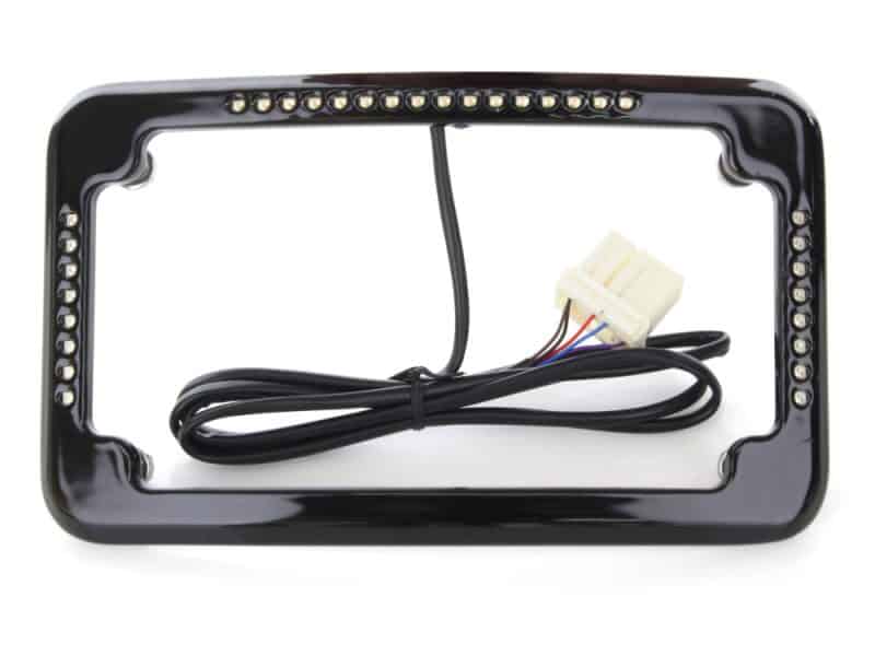 LED motorcycle license plate light frame with wiring harness for Revelry Cycles bikes.