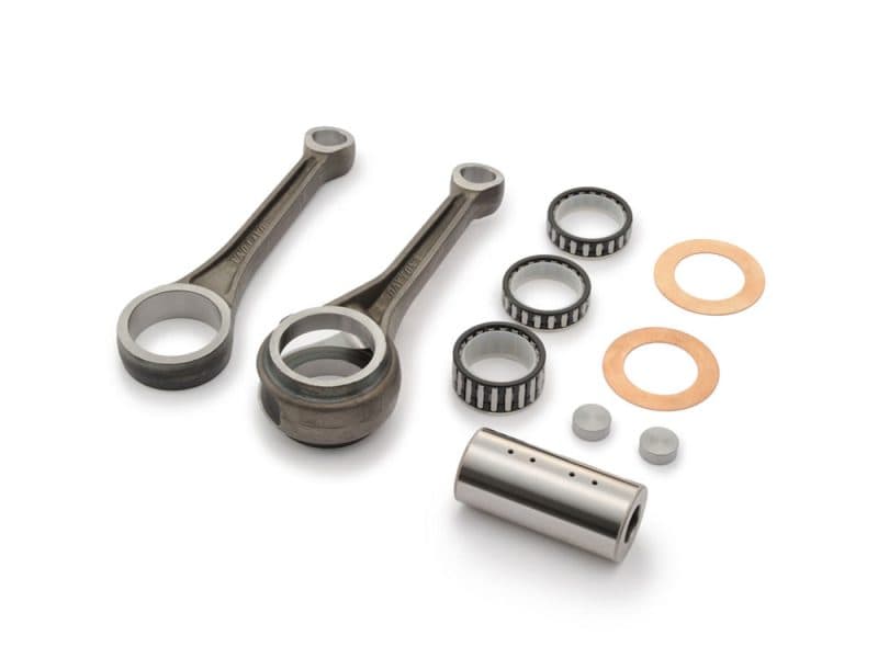 High-performance motorcycle connecting rod kit with bearings and copper washers. Designed for durability and optimal engine performance.