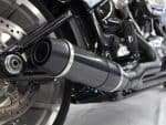 High-performance motorcycle exhaust system close-up.