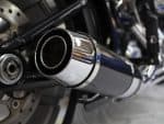 Polished chrome motorcycle exhaust pipe, rev head engine accessories, Revelry Motorcycles, Australia.