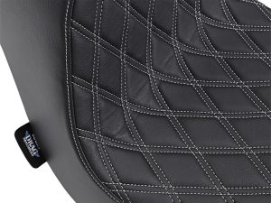 Luxury black motorcycle seat with diamond stitch quilting for comfort and style.