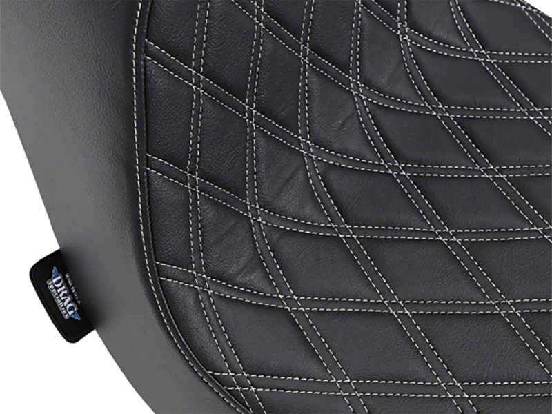 Luxury black motorcycle seat with diamond stitch quilting for comfort and style.