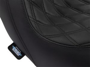 High-quality black motorcycle seat with durable leather material and detailed stitching.