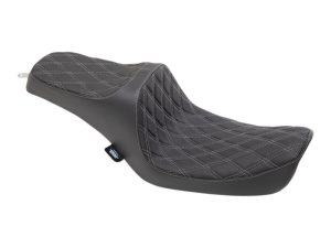 Leather motorcycle seat with diamond stitching for comfort and style.