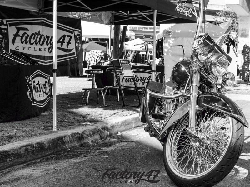 Classic vintage motorcycle at Revelry Cycles outdoor display.
