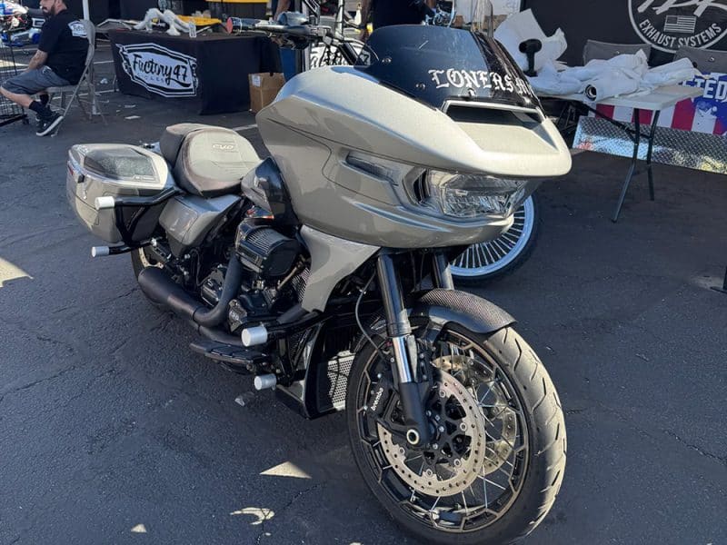 Motorcycle with modern fairing, black accents, and custom styling for adventure riding.