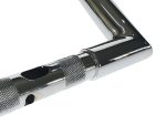 Precision motorcycle handlebar with textured grips and polished chrome finish.