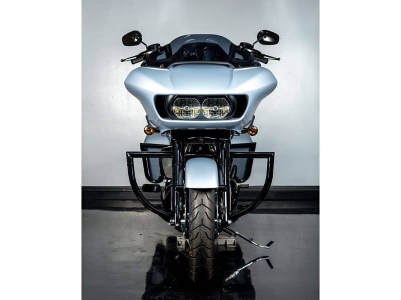 High-performance motorcycle with sleek silver aerodynamic design from Revelry Motorcycles.