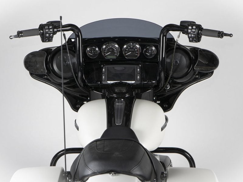 Vast Harley-Davidson touring motorcycle dashboard with audio system and navigation, ideal for long-distance riding.