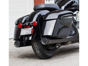 Black Indian motorcycle with chrome accents and custom exhaust pipes.