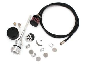 High-performance motorcycle fuel system components with hoses and fittings for Revelry Motorcycles.