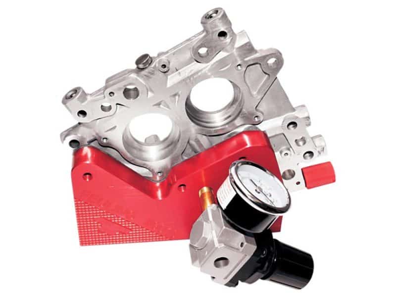 Aluminium motorcycle engine part with oil pressure gauge for Revelry Motorcycles.