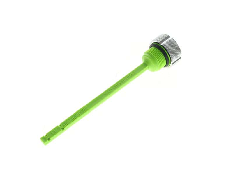 Green motorcycle oil filter removal tool for motorcycle maintenance and repair.