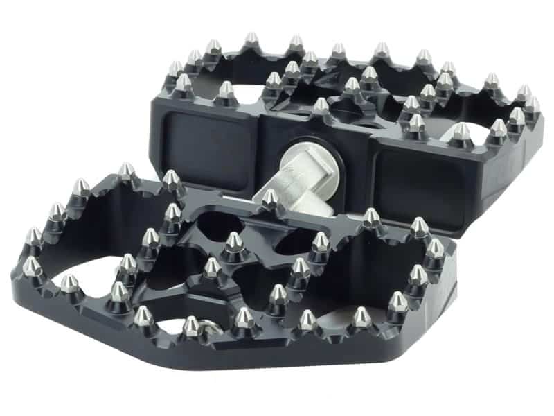 Heavy-duty motorcycle footpegs with anti-slip spikes for Revelry Motorcycles riding safety and stability.