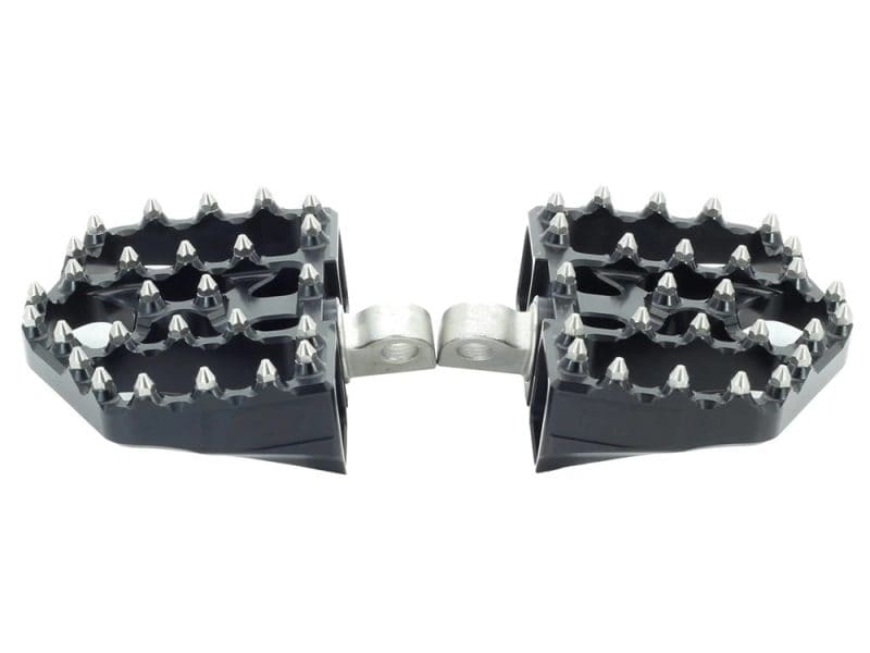 Non-slip motorcycle foot pegs with metal spikes for enhanced grip and control.