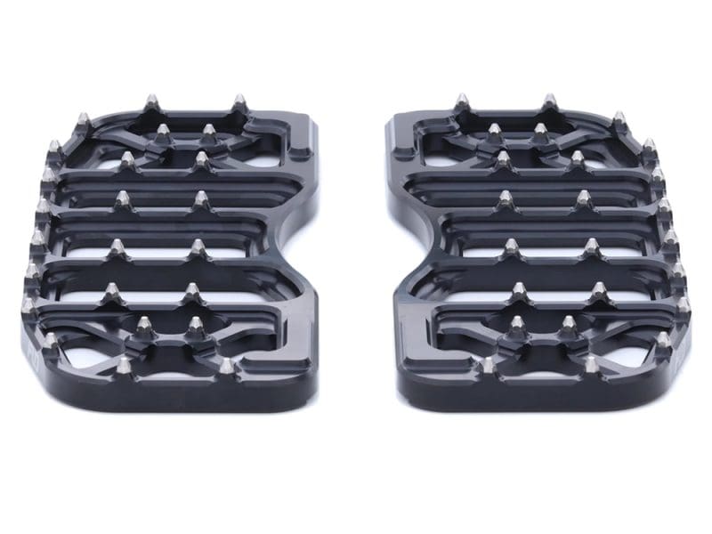 High-performance black motorcycle footpegs for Revelry Motorcycles.