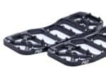 Aluminium bike pedals with metal studs for enhanced grip, suitable for adventure and mountain biking.