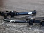 High-quality motorcycle handlebar with Flo branding for enhanced riding performance.