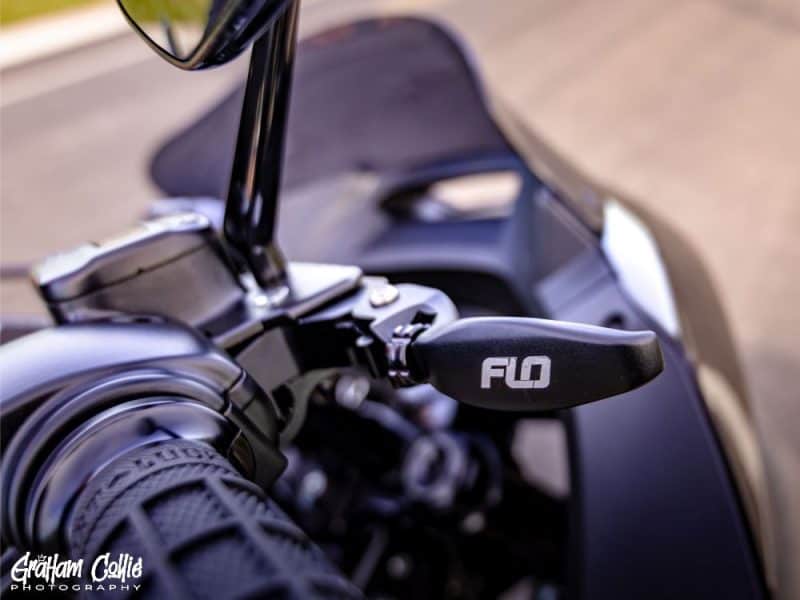 Motorcycle handlebar with Revelry Cycles branding, showcasing premium European motorcycle accessories.